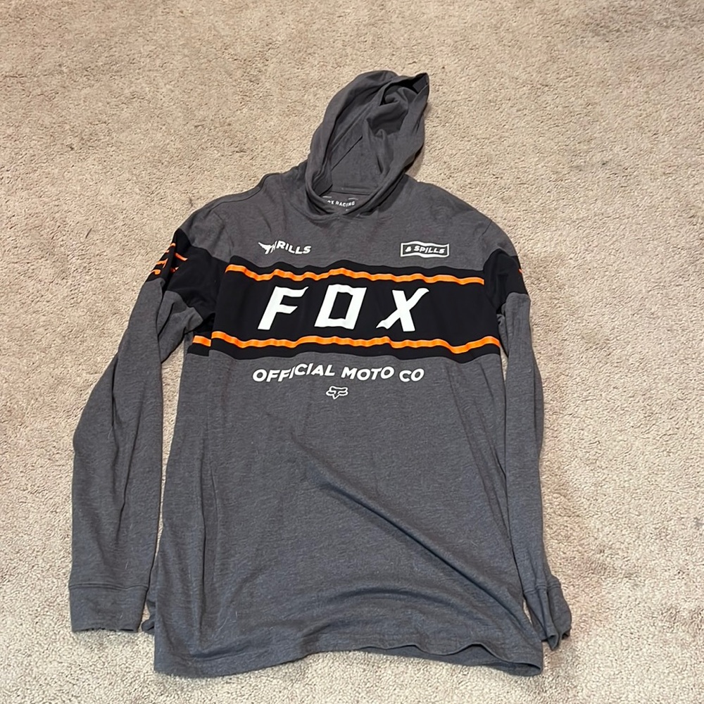 Fox long sleeve shirt with hood. Only worn few times still in brand new shape.